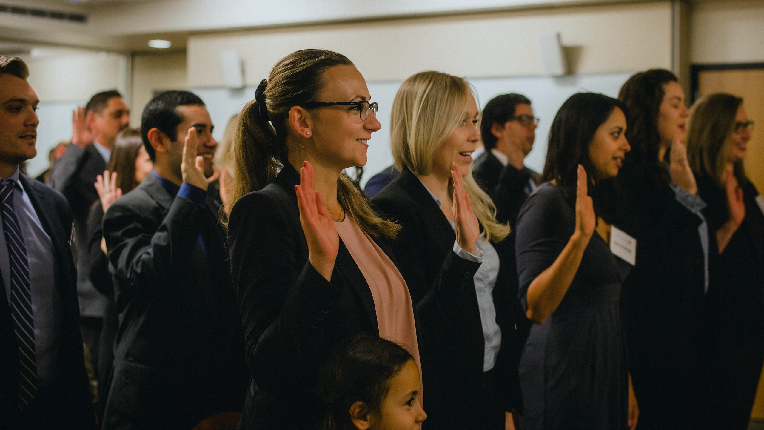 Group of Law students taking an oath.